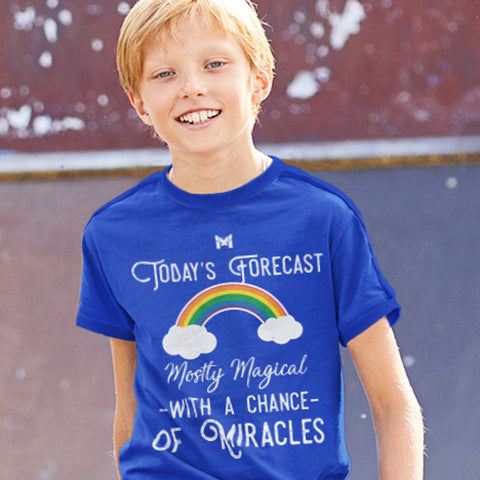 Young Boy Wearing Royal Blue T-Shirt That Says "Today's Forecast - Mostly Magical With A Chance Of Miracles"